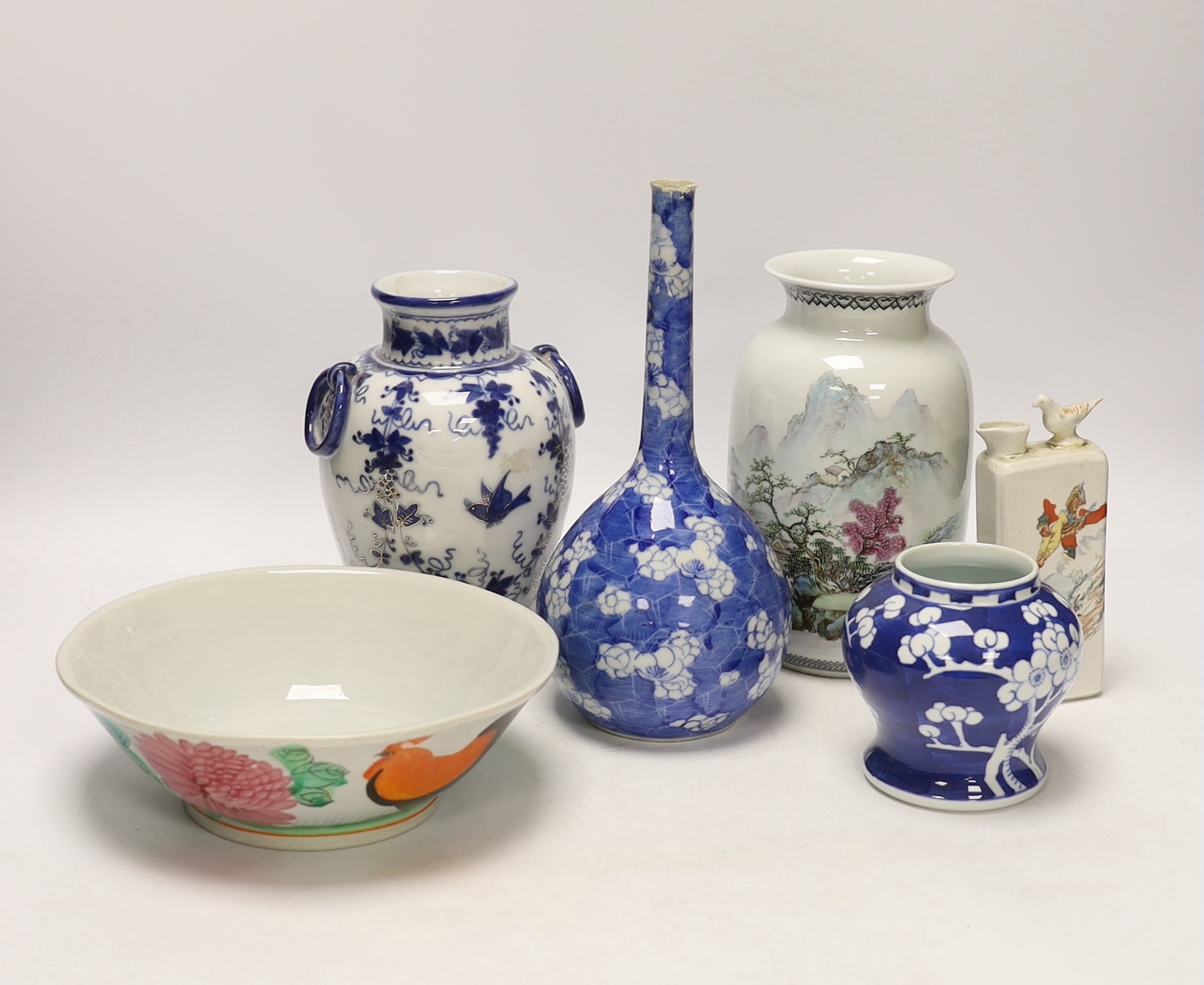 A collection of Chinese and Japanese ceramics, including a blue and white prunus flower baluster jar, largest 24cm high (6)